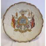 A Boer War commemorative ceramic plate. Reads 'Ready Aye Ready, God save our Queen'.