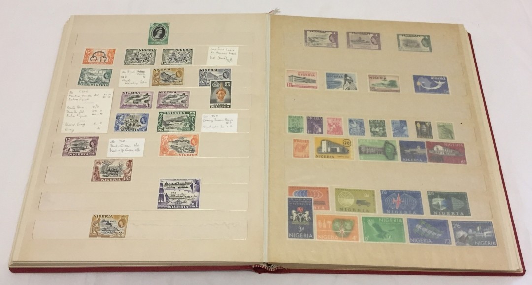 An album of West African stamps.