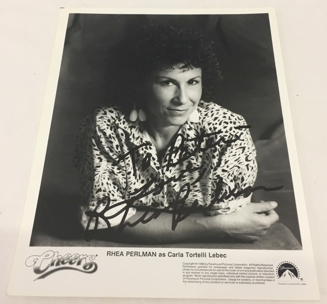 A signed "Cheers" photo of Rhea Perlman.