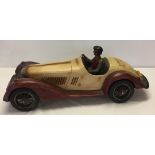 A very large scale model of a vintage racing car with driver, measures approx 71cm long.