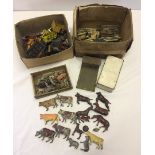 A box of lead farm animals, fences, walls & carts.