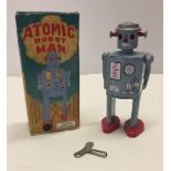 A boxed tin plate toy "Atomic Robot Man" from Schylling Collector Series Circa 1997.