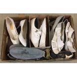 A box of circa 1980s vintage ladies shoes.