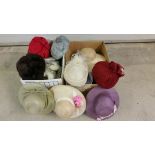 2 boxes of vintage hats.