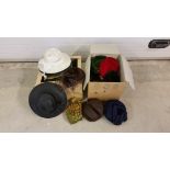 2 boxes of vintage hats.