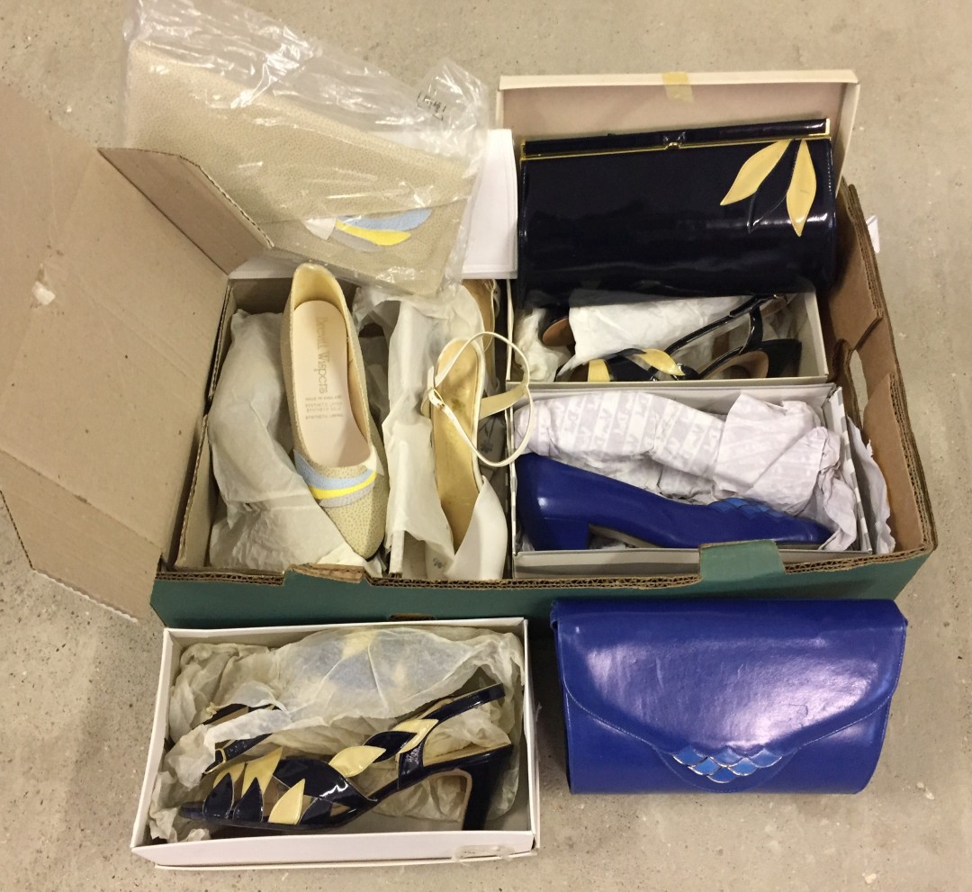 A box of vintage ladies shoes with matching handbags.