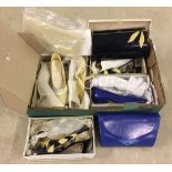 A box of vintage ladies shoes with matching handbags.