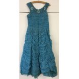 Sleeveless blue long dress. No label.