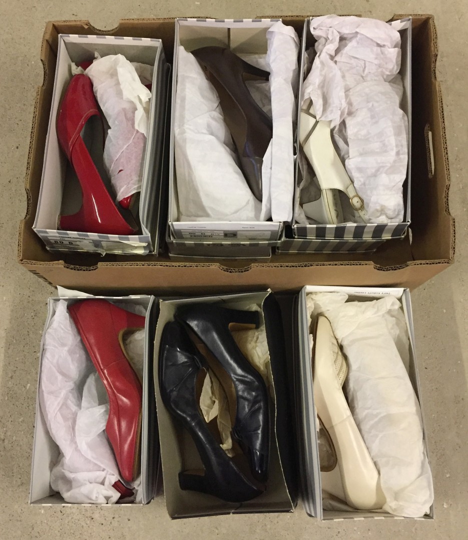 A box of vintage ladies Van-Dal shoes.