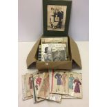 A quantity of c1940s ladies dress and cardigan patterns, 6 vintage sewing books and a 1940s photo.