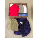 Box of jackets, trouser suits, jumpers, and tops.