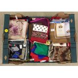 A box of assorted vintage ladies square scarves.