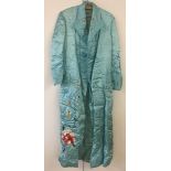 Vintage pale aqua blue satin dressing gown with embroidery decoration.