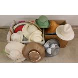 2 boxes of assorted coloured vintage hats.