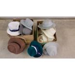 2 boxes of vintage hats.