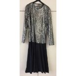 Calf-length dress, black with silver top. Citilights.