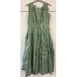 Green/gold/blue brocade dress. No label.