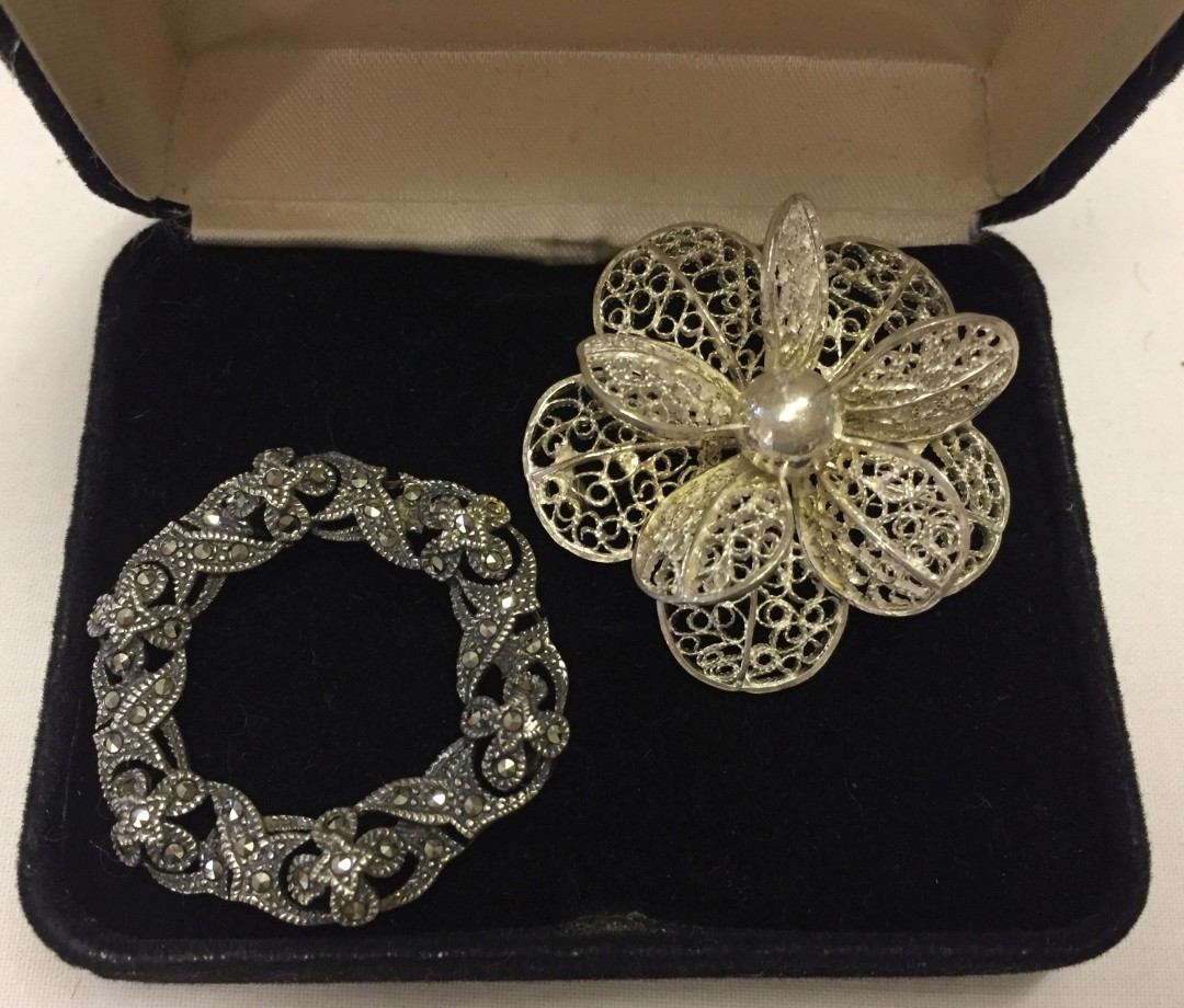 2 vintage silver brooches, one 925 marcasite, the other continental filligree silver.