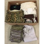 Box of short and long skirts, blouses, jumpers, cardigan, suits and trousers.