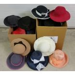 2 boxes of vintage hats.