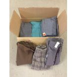 Box of mostly new long and short skirts.