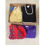 Box of suits, skirts, blouses, tops, jumpers and cardigans.