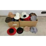 2 boxes of vintage hats.