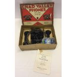 A Chad Valley telephones set in original box.