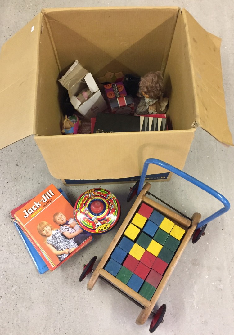 A box of vintage toys & games to include push-along bricks, and a Chad Valley tinplate top.
