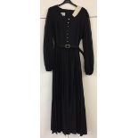 Pleated black buttoned dress. Clifton.