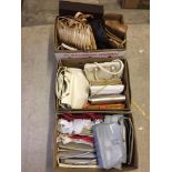 3 boxes of quality vintage daywear handbags of various colours, many being leather.