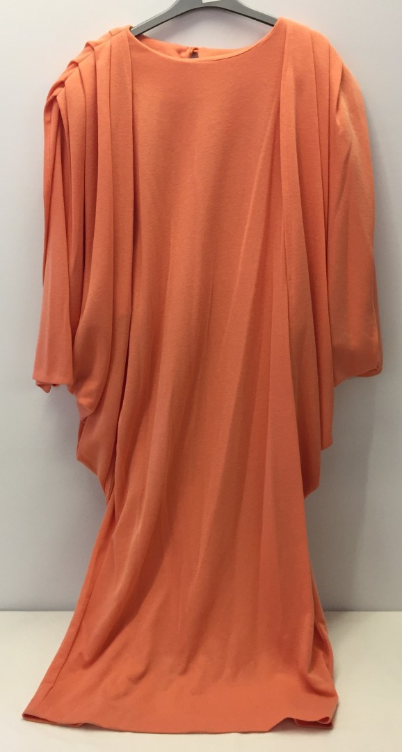 Draped orange jersey dress. No label.