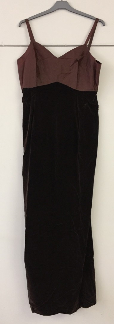 A long brown velvet evening dress.