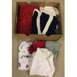 Box of new womens winter jumpers, dresses, trousers, tops and skirts.