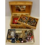 A wooden musical jewellery box and a tray of vintage & modern costume jewellery.