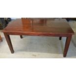 A stained pine 5 plank dining table.