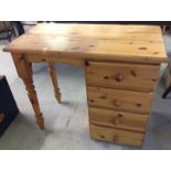A pine 4 drawer desk/dressing table.