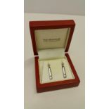 A boxed pair of 925 silver Hot Diamonds earrings.