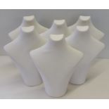 A quantity of 6 white, leather effect display busts for jewellery.