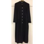 Black East ankle-length coat in heavy linen.