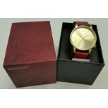 A boxed mens "Winston" watch by Komono.