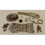 A box containing a quantity of silver/white metal items.