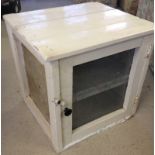 A vintage white painted wooden larder cupboard with wire mesh front & sides.