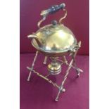 A vintage brass spirit kettle & stand
