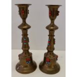 A pair of brass candlesticks.