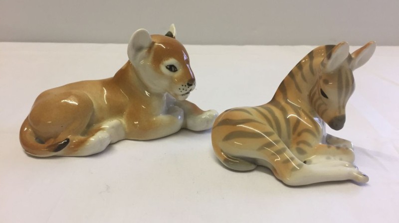 2 Lomonosov/USSR pottery figurines. A lion cub and a zebra.