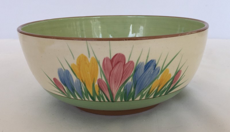 An A.J Wilkinson Honey glaze "Crocus" bowl with green interior.