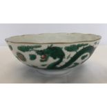 A Chinese footed bowl with dragon & flaming pearl decoration.