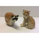 2 Lomonosov/USSR ceramic figurines. A racoon and a leopard.