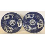 2 oriental ceramic blue and white chargers with cherry blossom and floral design.